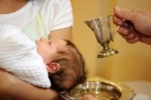 7647084-the-baptism-of-little-baby-with-blessed-water-from-iron-jug